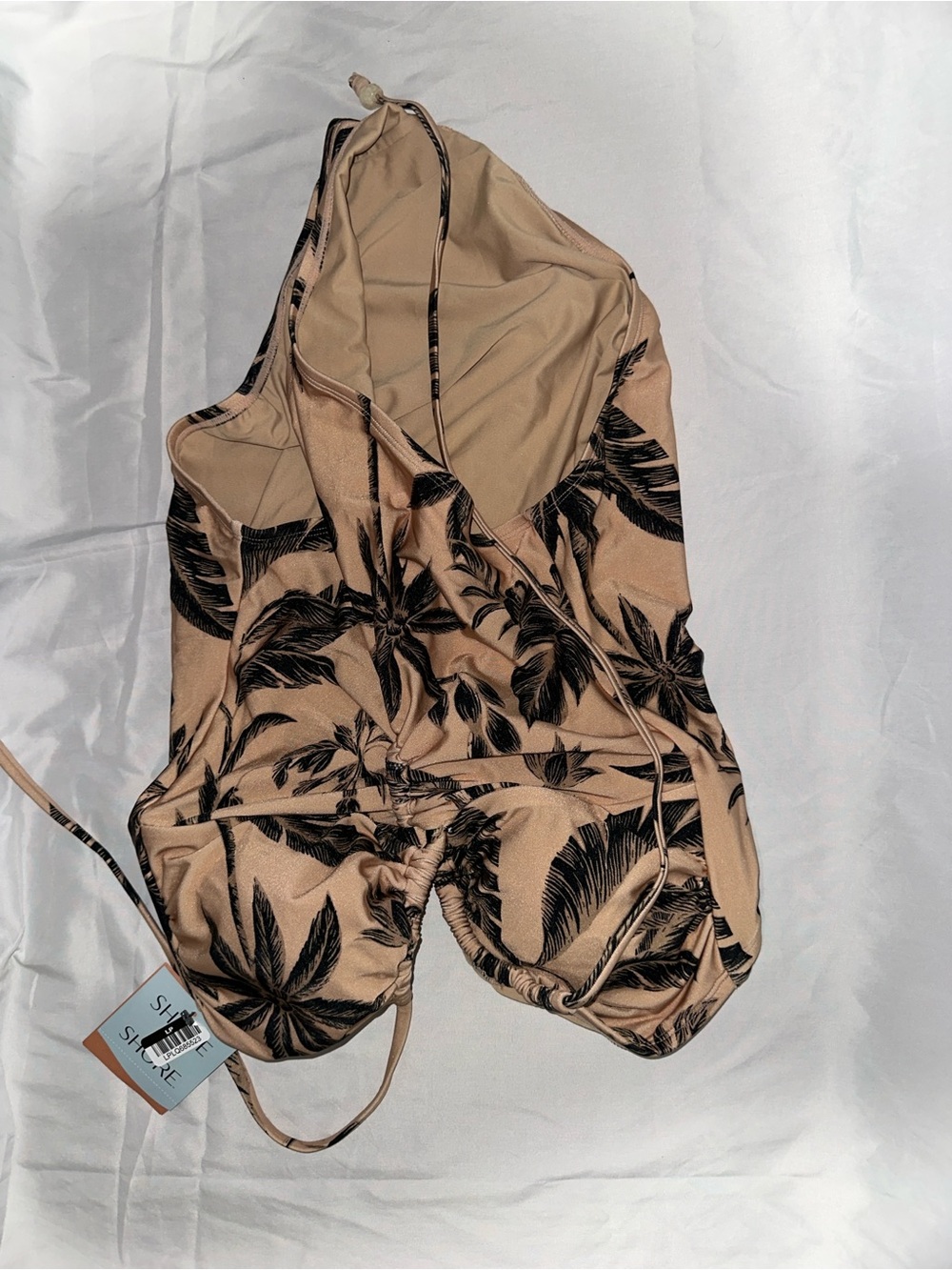 Stylish  One-Piece Swimsuit in Tan with Black Tropical Print